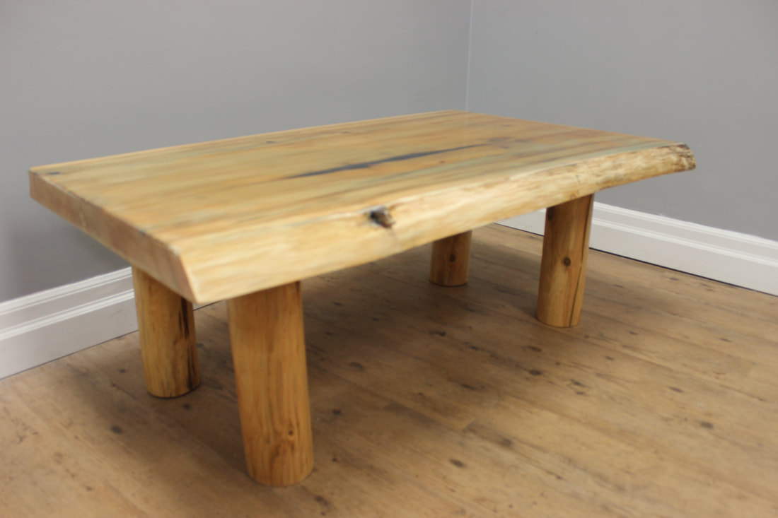 live-edge coffee table with wood legs